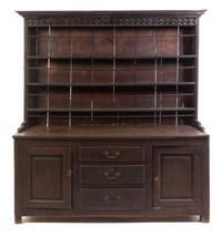 An Oak Welsh Dresser Height 74 1/2 x width 66 1/2 x depth 20 1/4 inches.