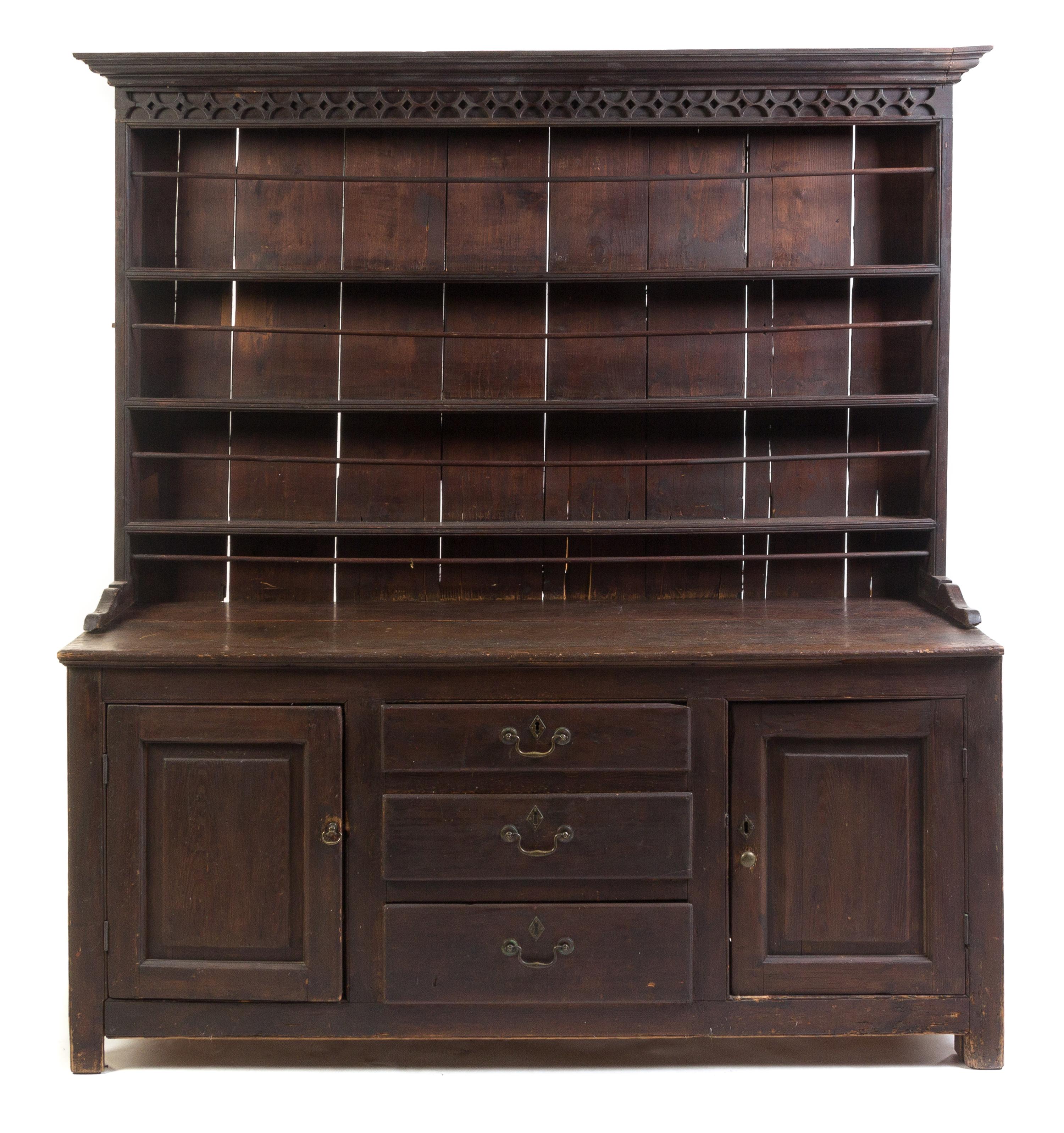 An Oak Welsh Dresser Height 74 1/2 x width 66 1/2 x depth 20 1/4 inches.