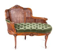 A Louis XV Style Caned Settee