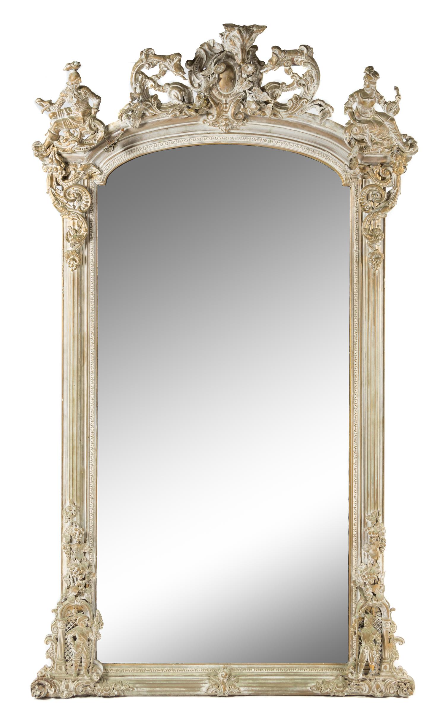 A Rococo Style Cerused Wood and Composition Pier Mirror Height 94 x width 52 inches. — 20TH CENTURY