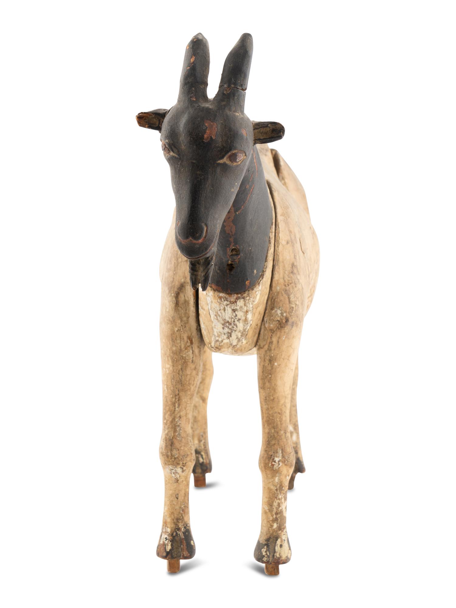 A Carved and Painted Wood Billy Goat Figure