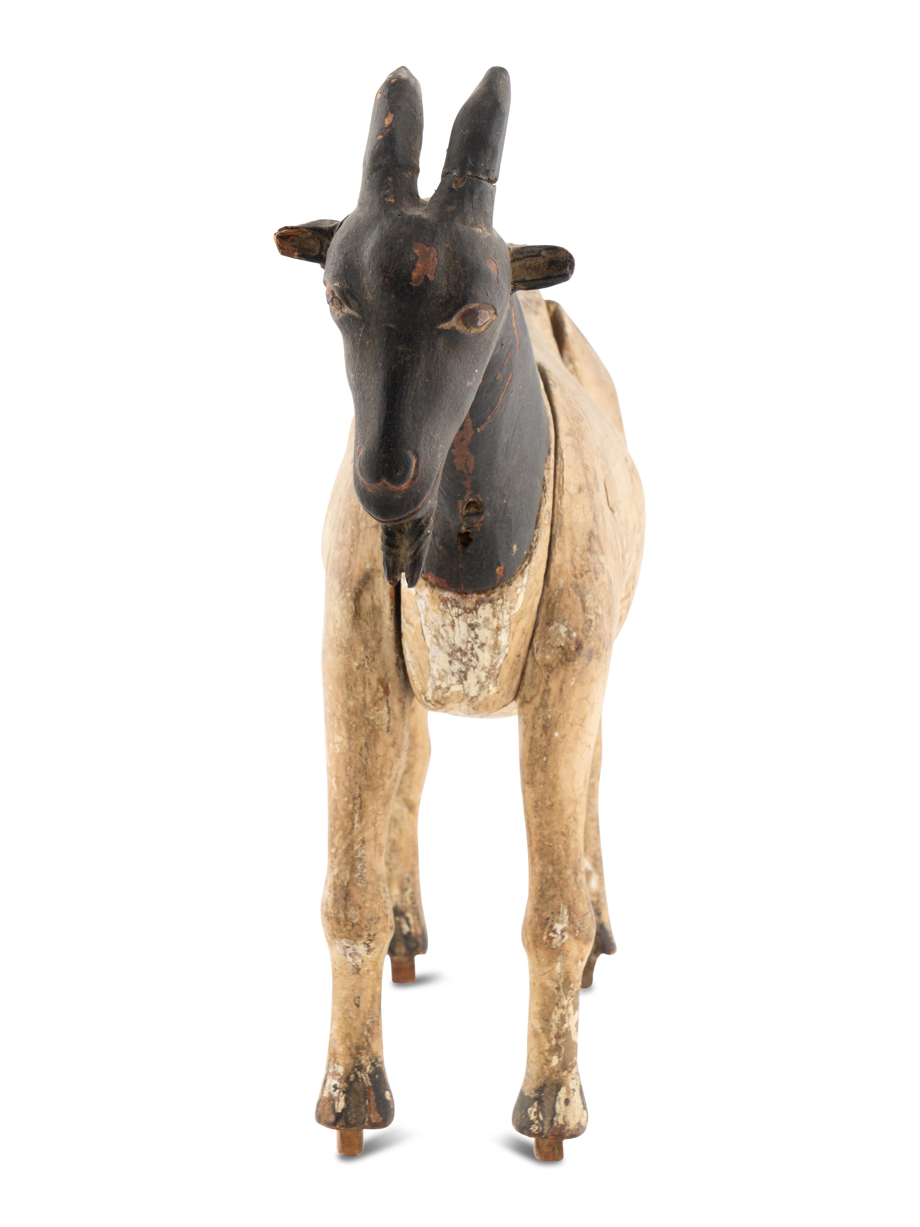 A Carved and Painted Wood Billy Goat Figure