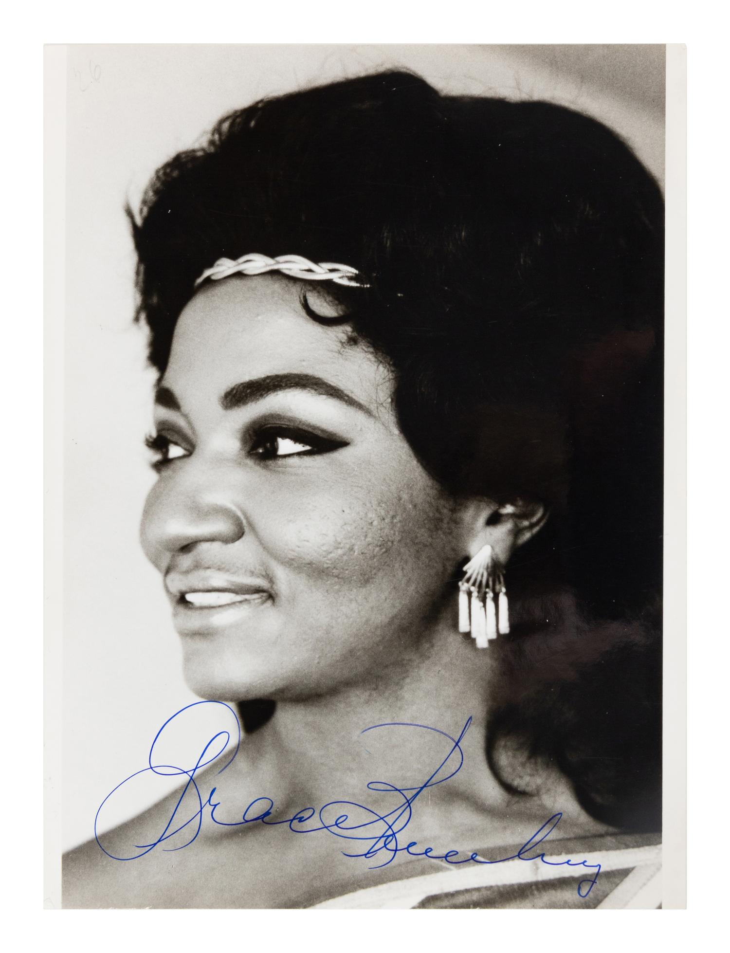 [20TH-CENTURY OPERA SINGERS]. A group of 6 photographs or photographic postcards of opera singers, most signed, from the 1950s-1960s, comprising images of: