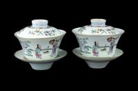 A Pair of Chinese Famille Rose Porcelain Covered Tea Bowls and Undertrays