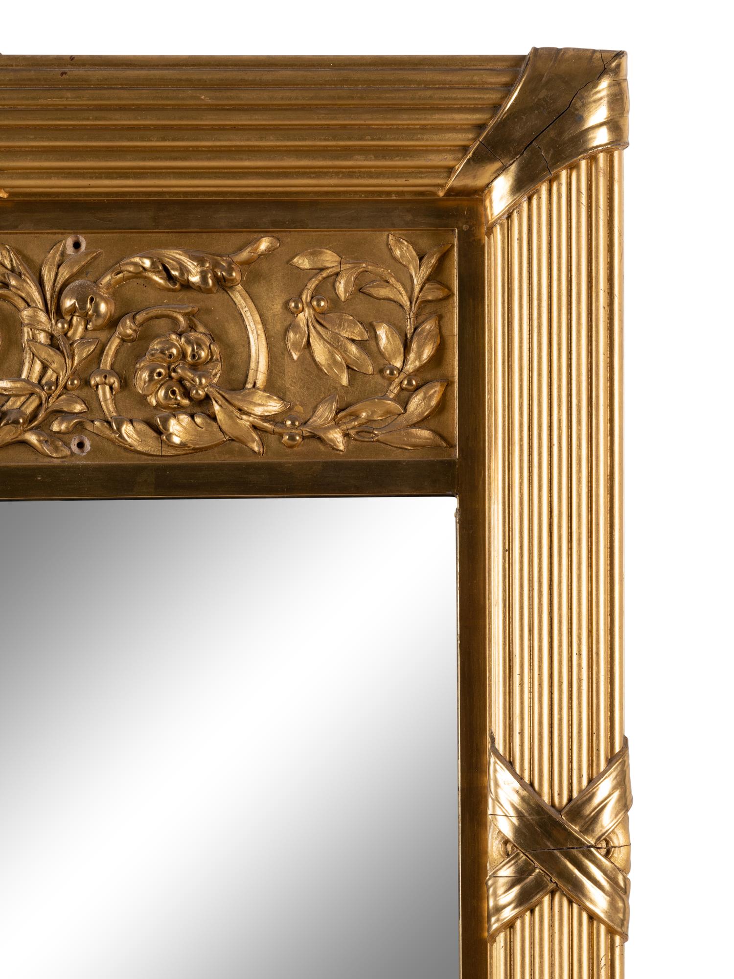 A Large Neoclassical Style Giltwood Mirror