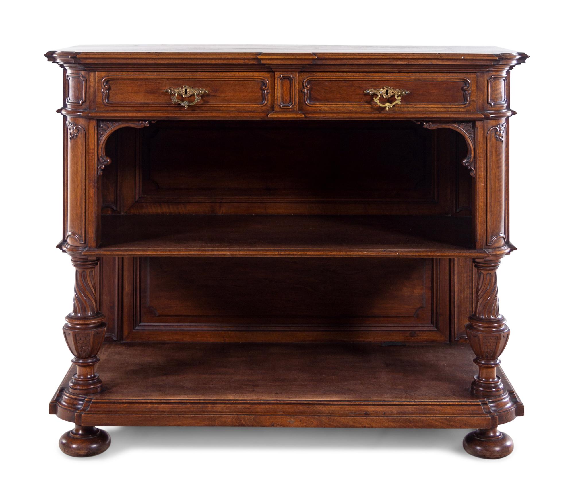 A Continental Carved Walnut Sideboard