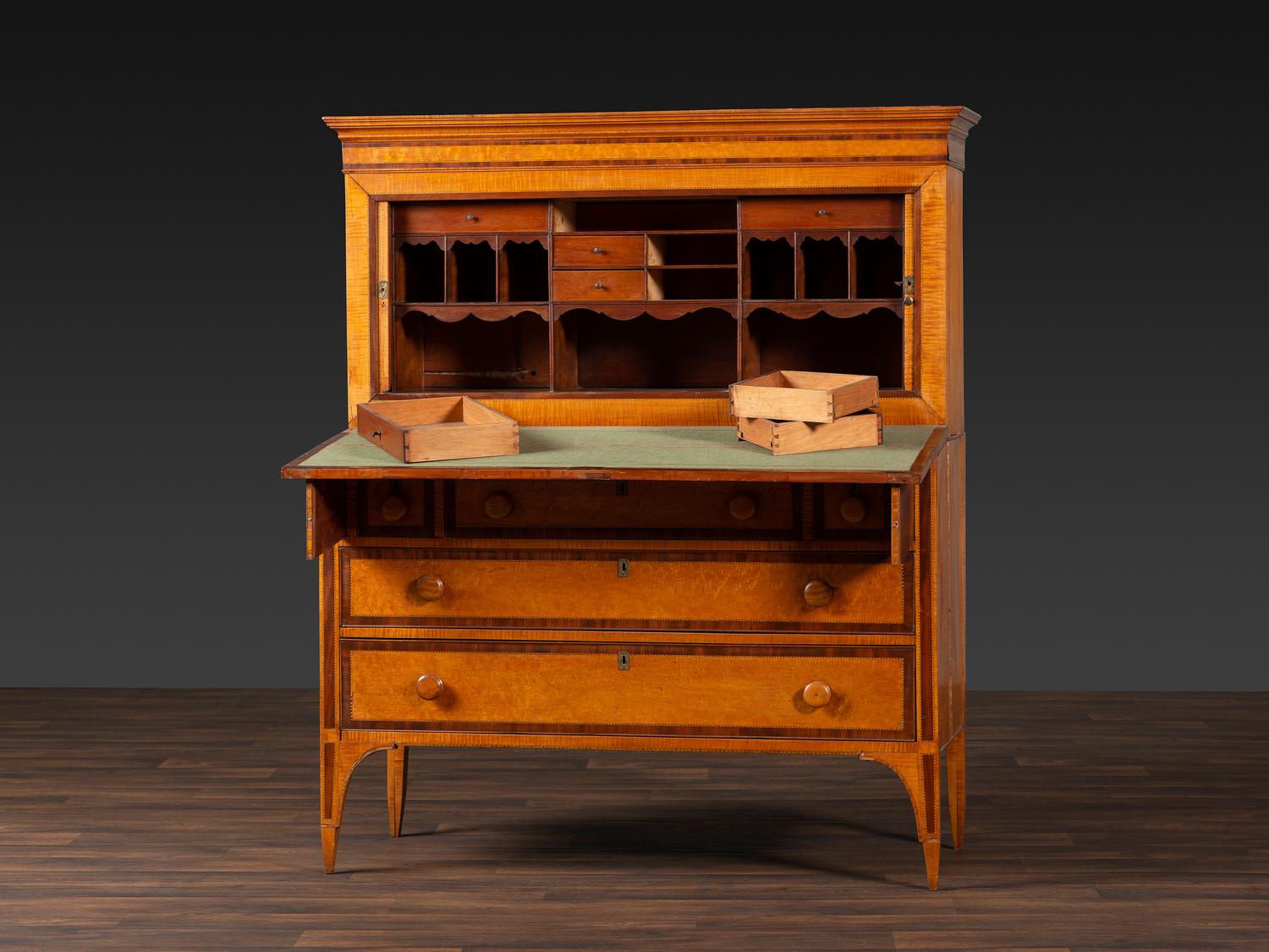 A Federal Inlaid Bird's Eye Maple and Mahogany Tambour Writing Desk