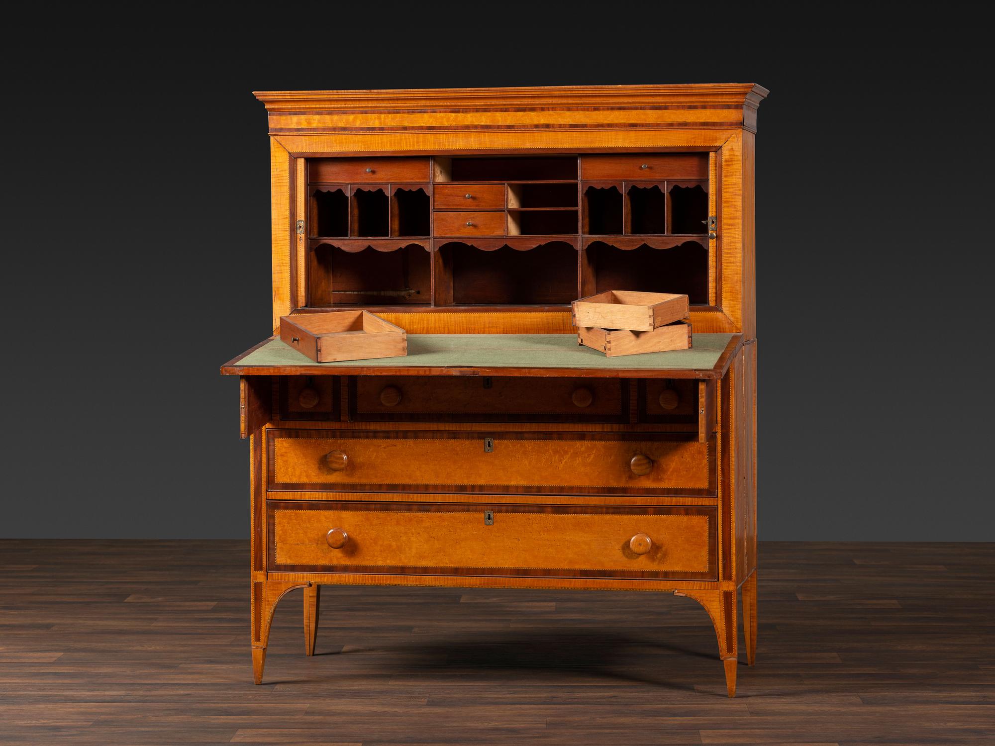 A Federal Inlaid Bird's Eye Maple and Mahogany Tambour Writing Desk
