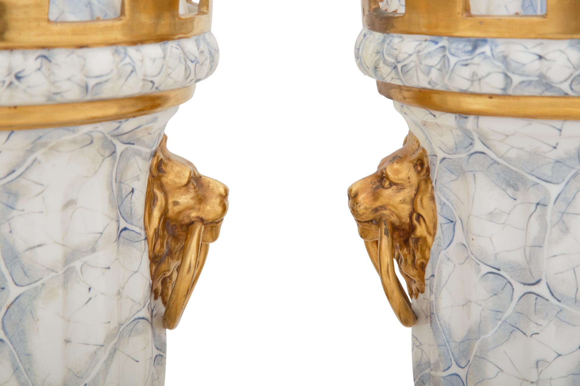 A Pair of English Parcel Gilt Porcelain Fruit Coolers