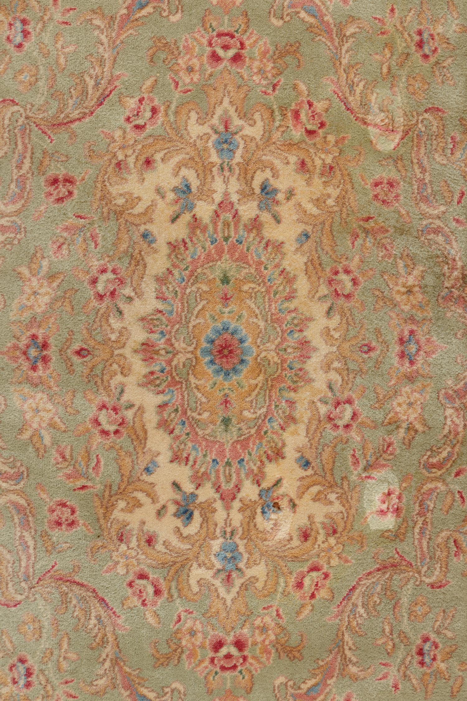 A Kirman Wool Rug