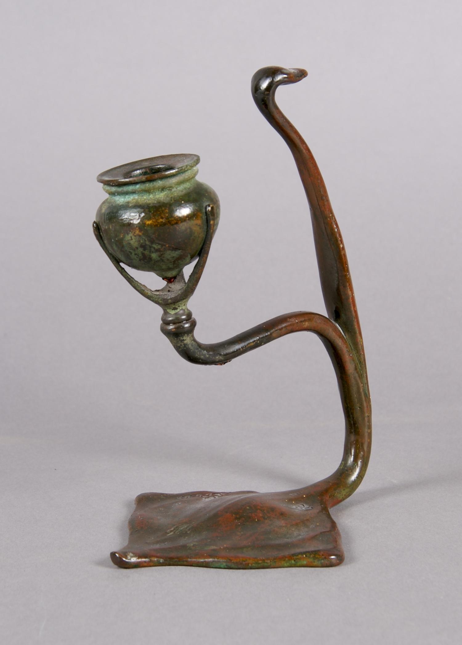 A Tiffany Studios Bronze Candlestick, Height 7 3/4 inches.