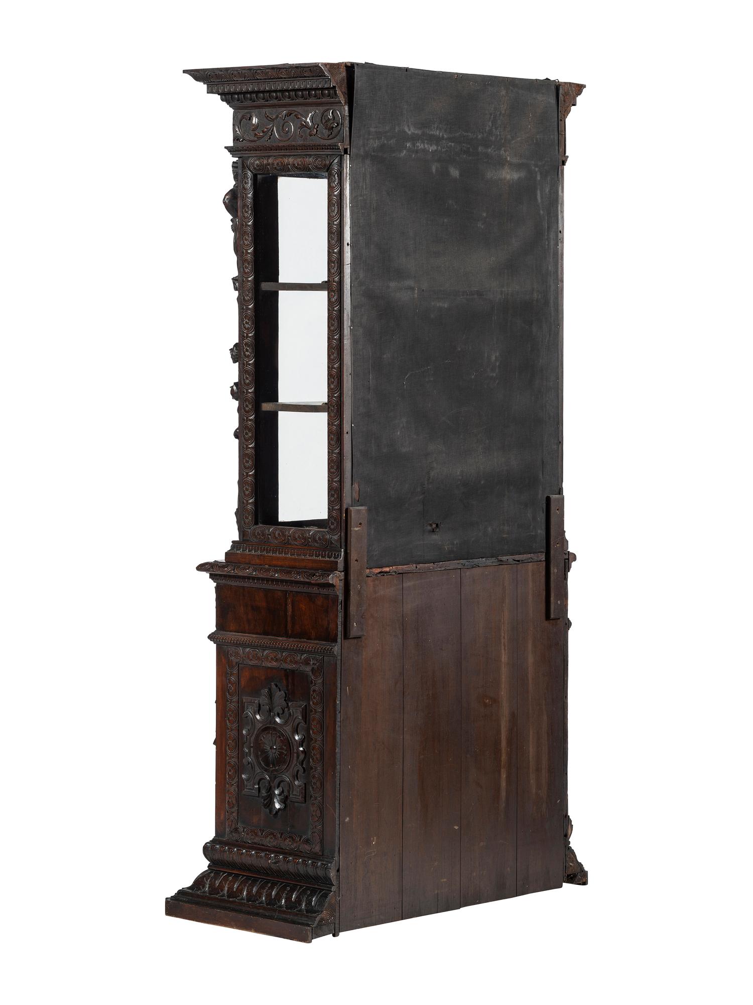 An Italian Renaissance Revival Carved Walnut Bookcase or Vitrine Cabinet
