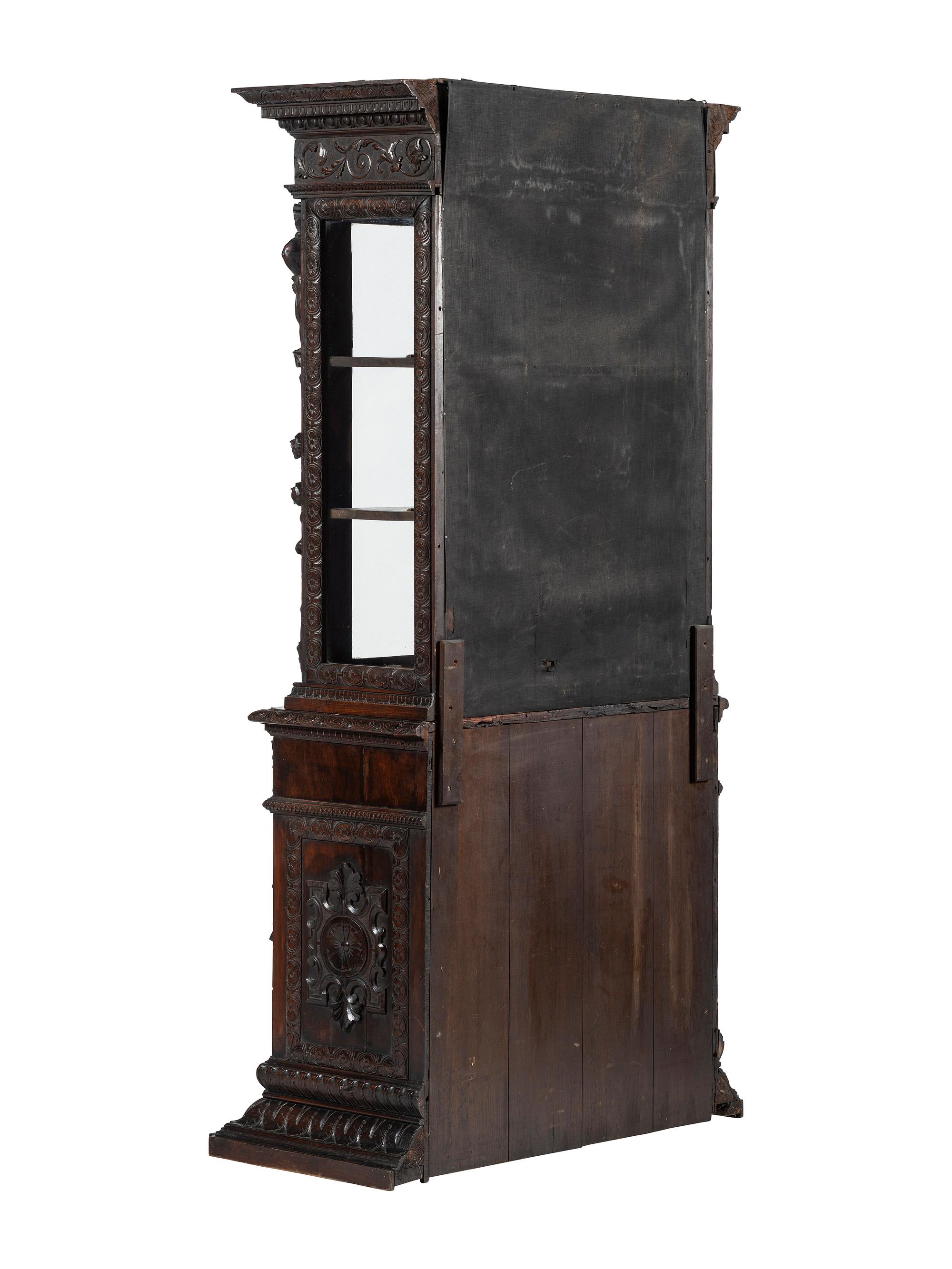 An Italian Renaissance Revival Carved Walnut Bookcase or Vitrine Cabinet