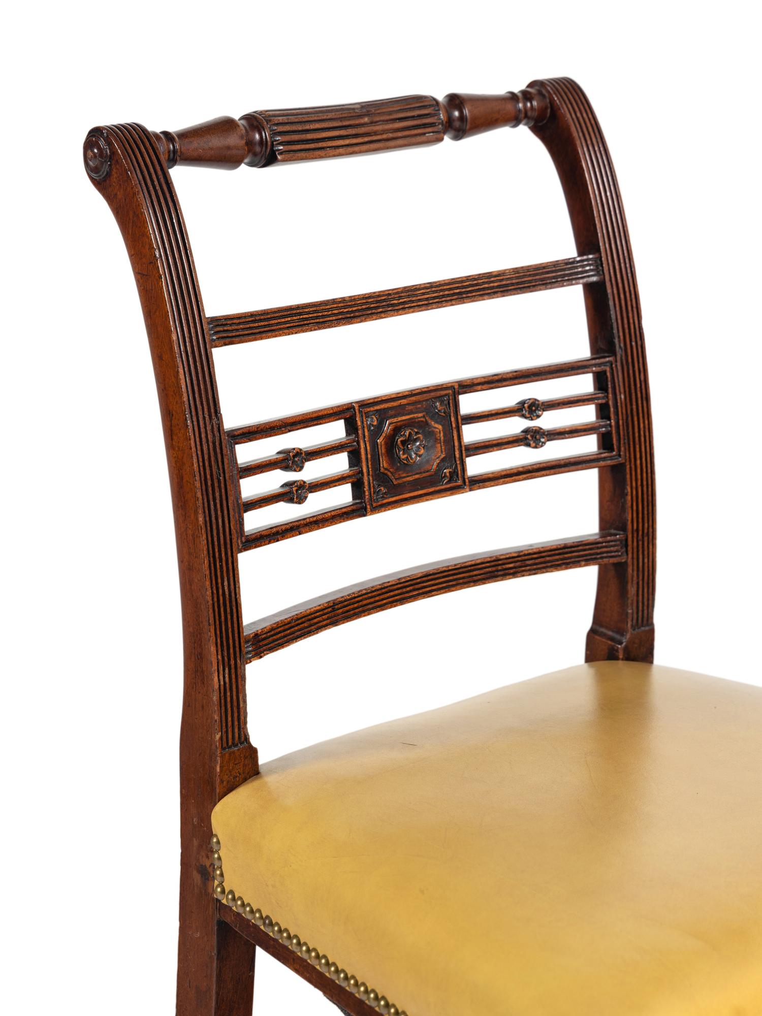 A Set of Six George III Mahogany Leather-Upholstered Dining Chairs