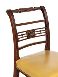 A Set of Six George III Mahogany Leather-Upholstered Dining Chairs
