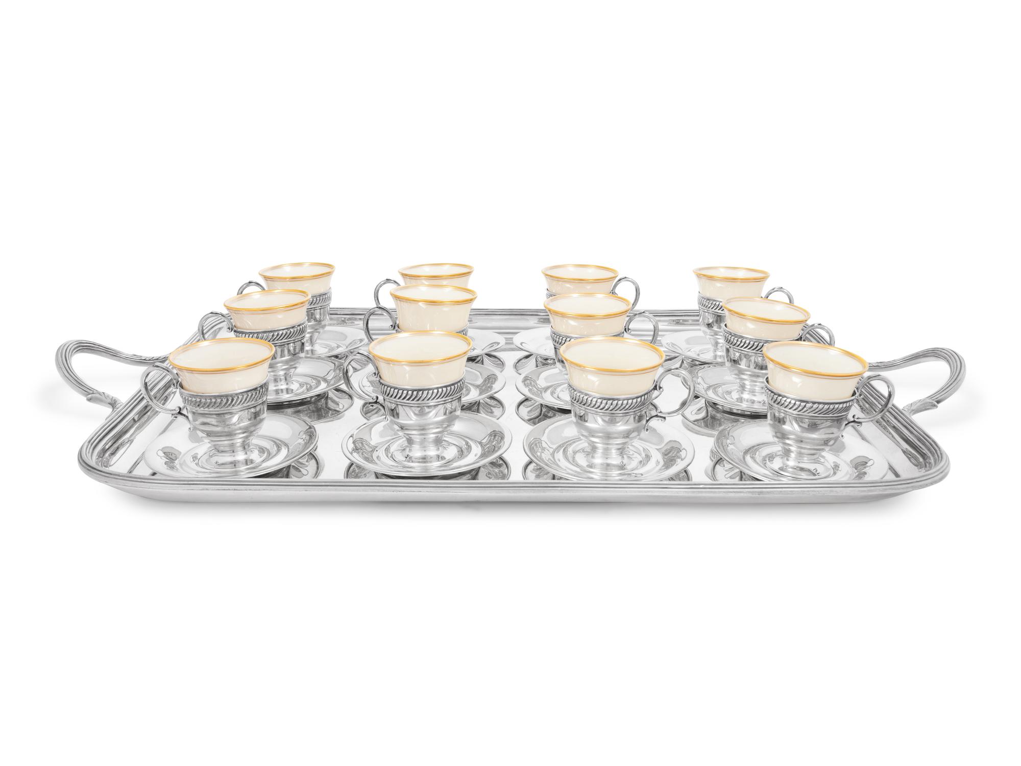 A Set of Twelve Silver Coffee Cups with Porcelain Liners, Twelve Saucers and an Associated Silver-Plate Tray