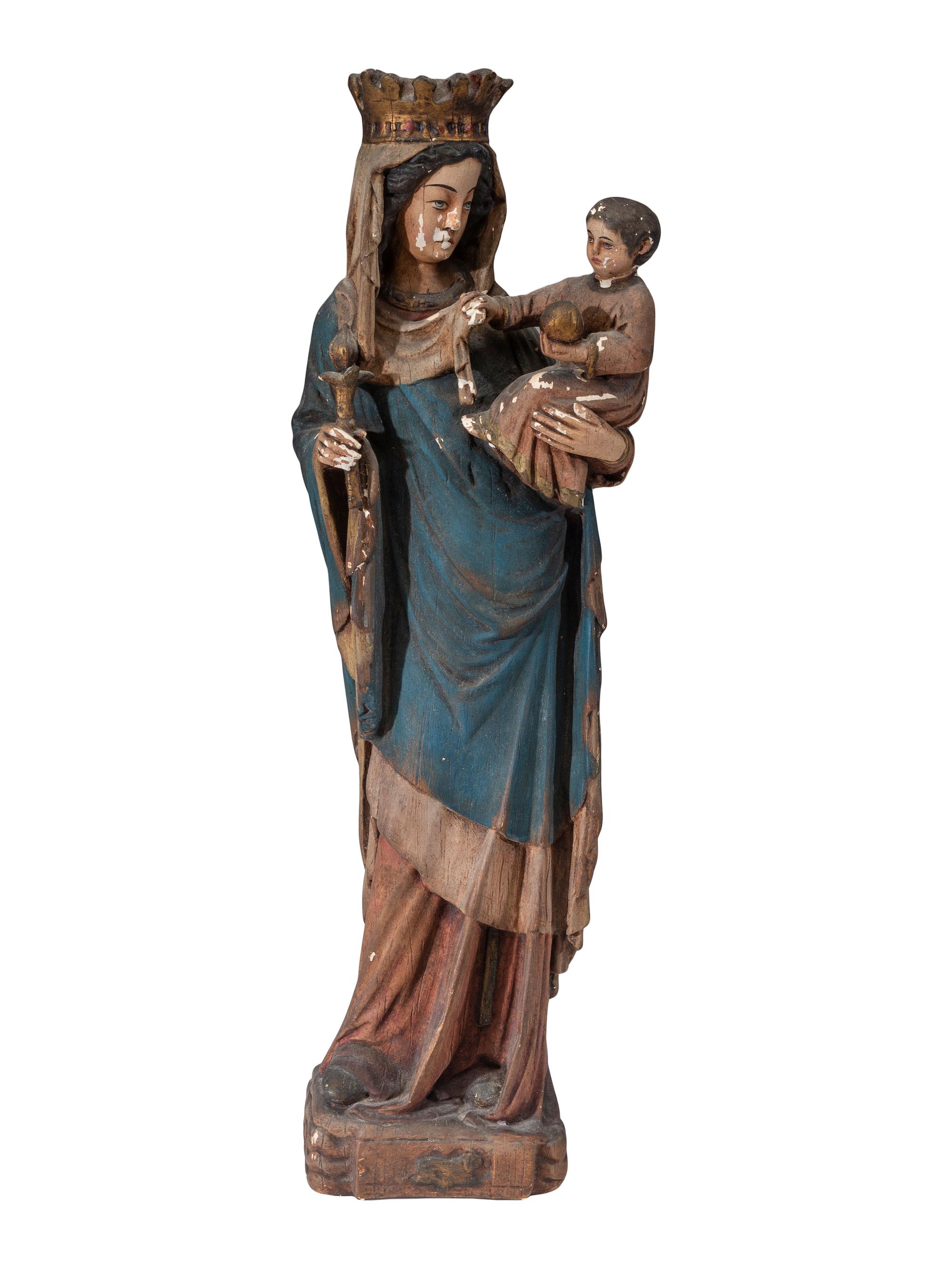 A Continental Paint Decorated Chalkware Santos Figure of the Madonna and Child
