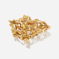 A fourteen karat gold, cultured pearl, and diamond brooch