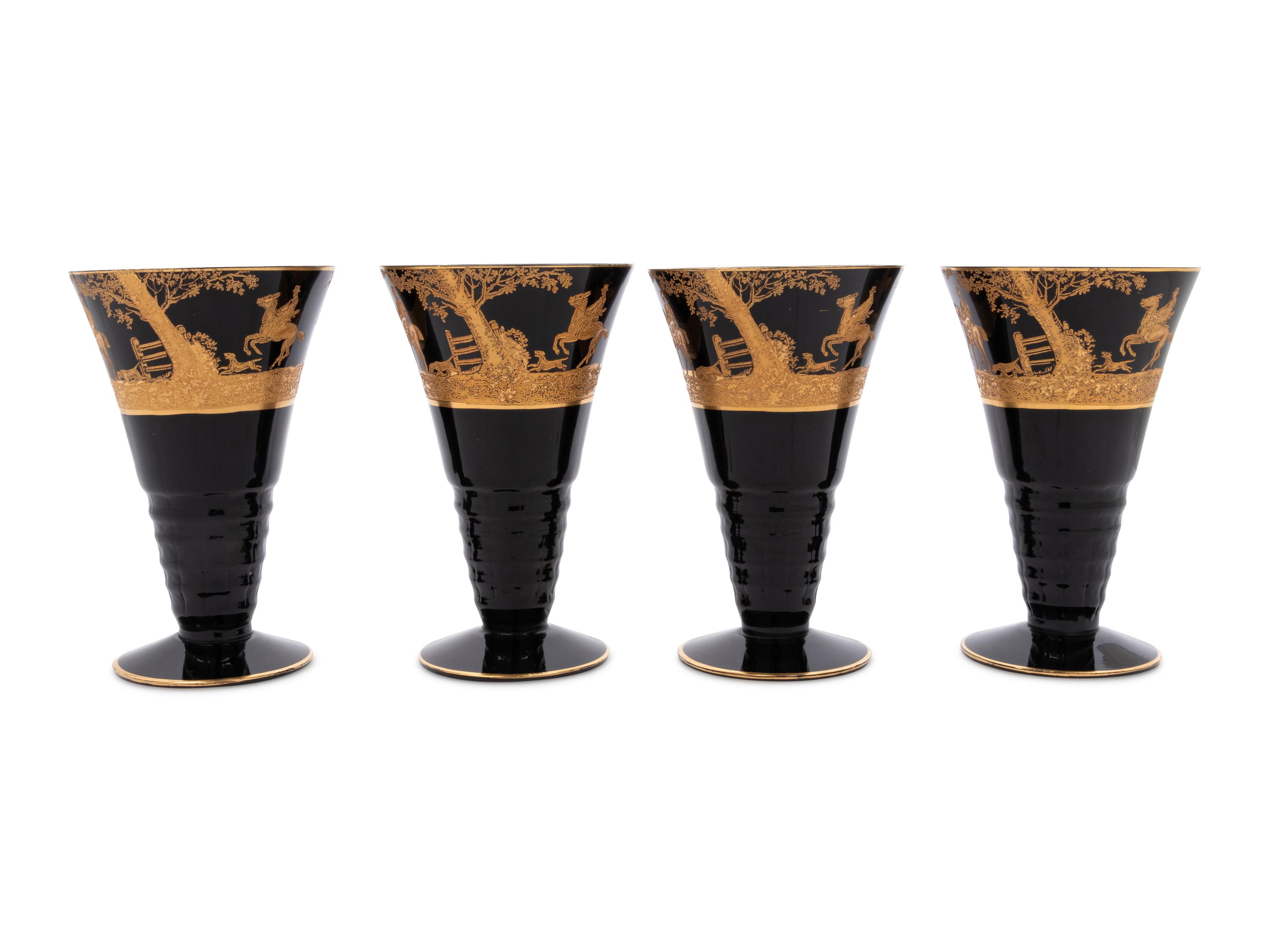 Four Continental Gilt Decorated Dark Amethyst Glass Goblets Depicting Hunting Scenes