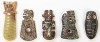 A Group of Five Carved Hardstone Toggles Height of tallest 3 3/8 inches.