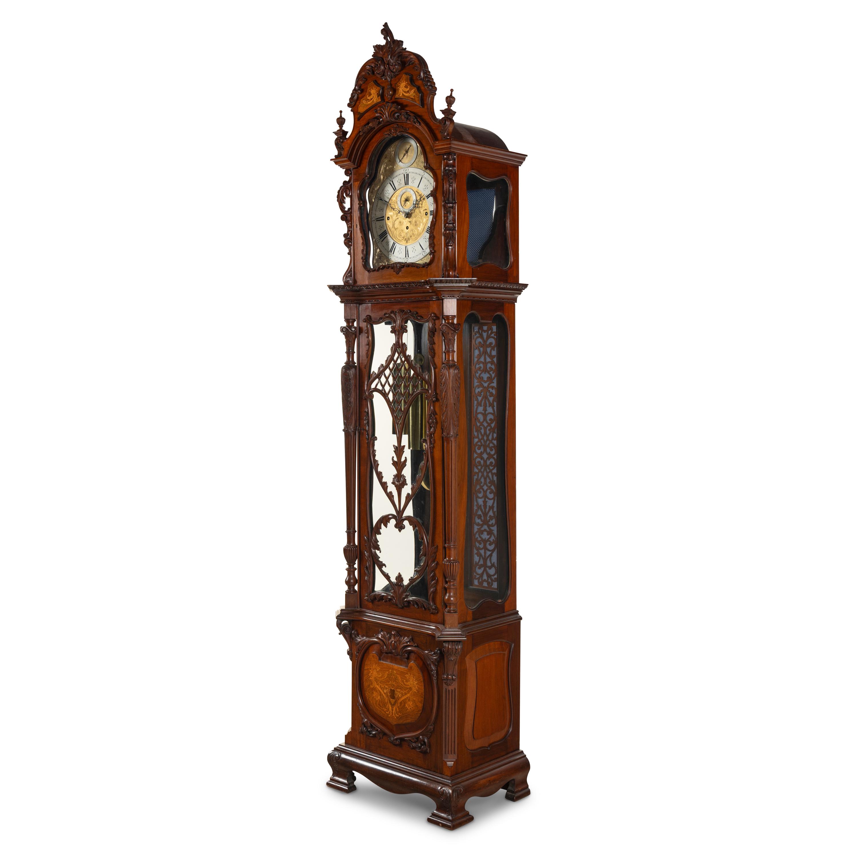 An English Carved Walnut Tall Case Clock