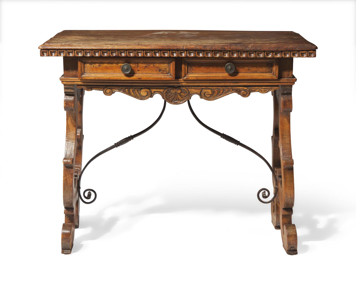 A Spanish Baroque walnut and iron stretcher table, late 17th / 18th century