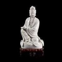 A Chinese blanc de chine figure of Guanyin 德化窑观音造像 "Dehua" and "Puji Yuren" mark ”??“ ? “????” ??