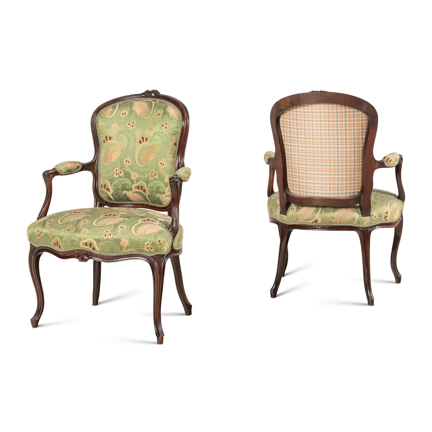 A Pair of Louis XV Style Carved Mahogany Armchairs