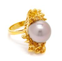 An 18 Karat Yellow Gold, Cultured South Sea Pearl and Colored Diamond Ring, 6.60 dwts.