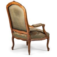 A Louis XV Style Carved Walnut and Needlework Upholstered Fauteuil