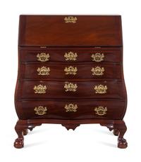 A Chippendale Style Carved Mahogany Bombe-Form Slant-Front Desk