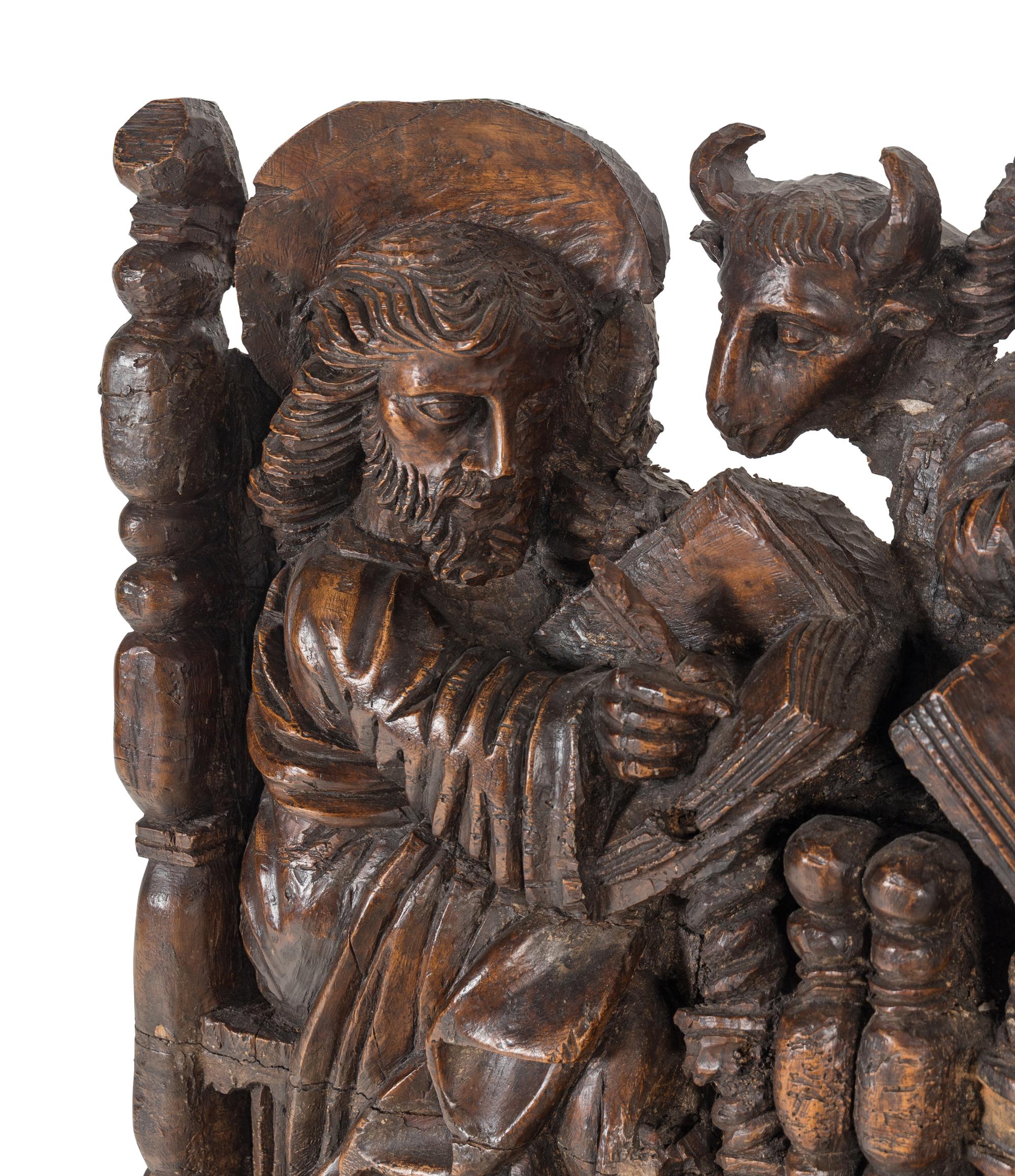 A Spanish Colonial Walnut Frieze Depicting the Four Evangelists