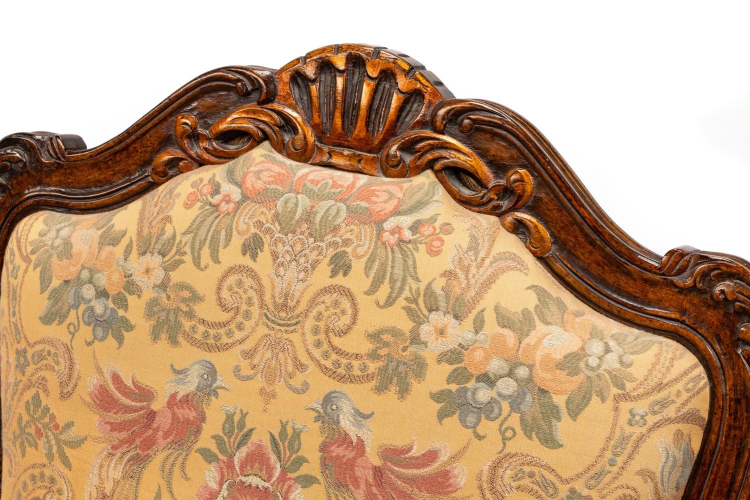 A Pair of Louis XV Style Walnut Fauteuils