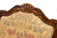 A Pair of Louis XV Style Walnut Fauteuils