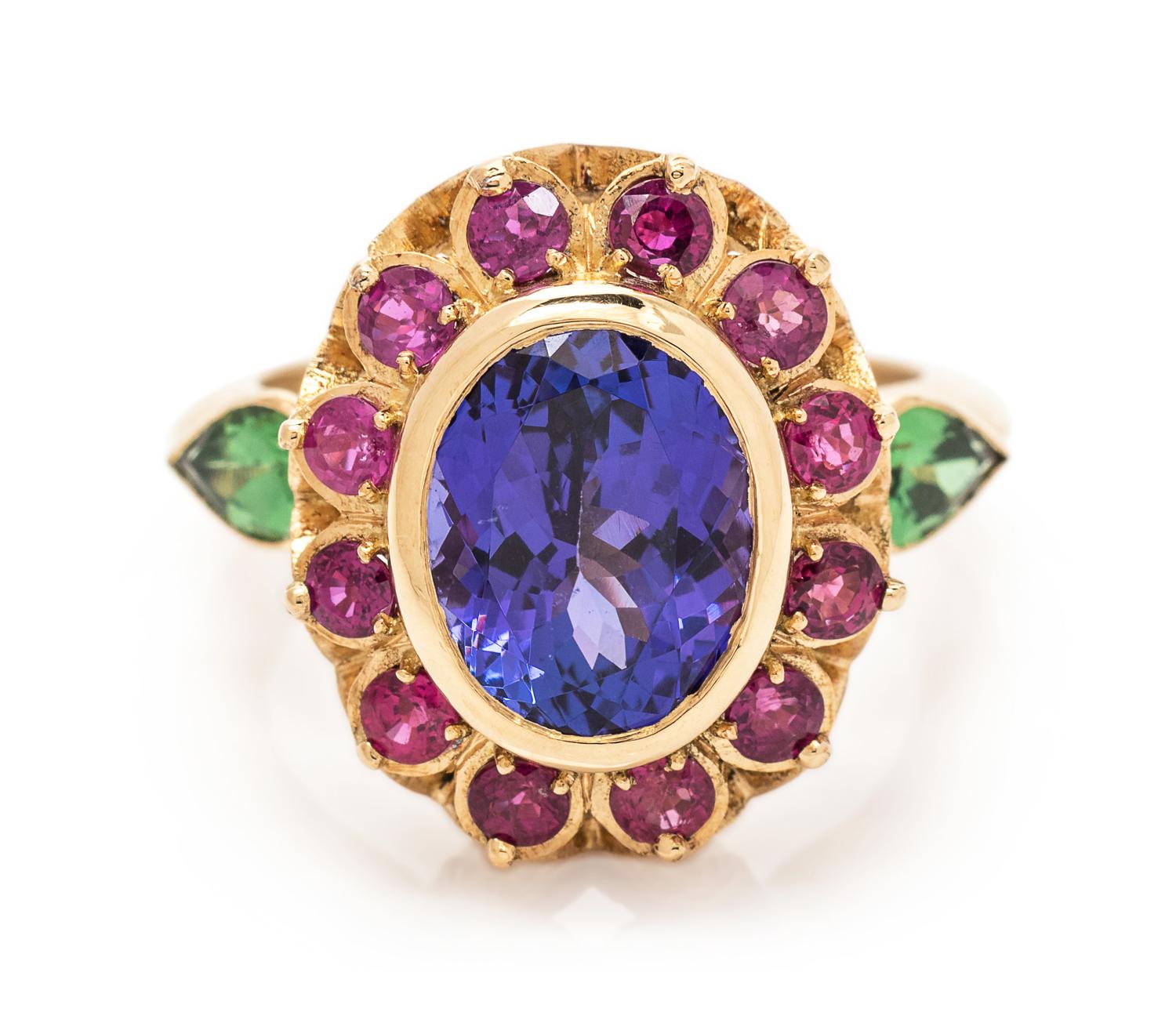 An 18 Karat Yellow Gold, Tanzanite, Ruby and Green Stone Ring,