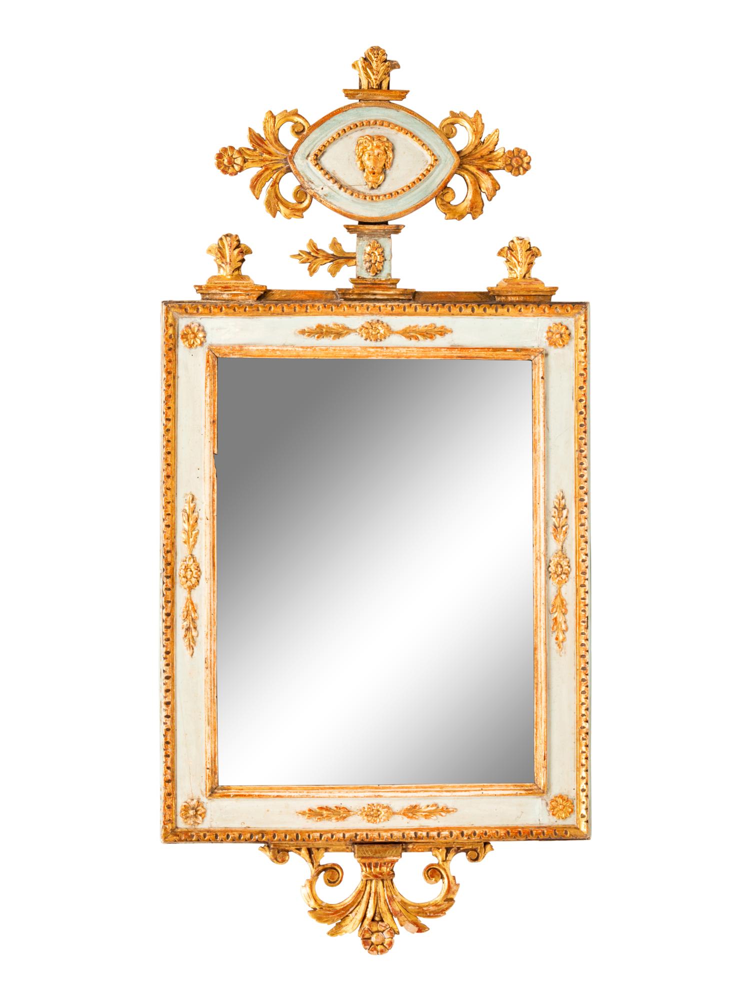An Ornate Gilt Wood Mirror