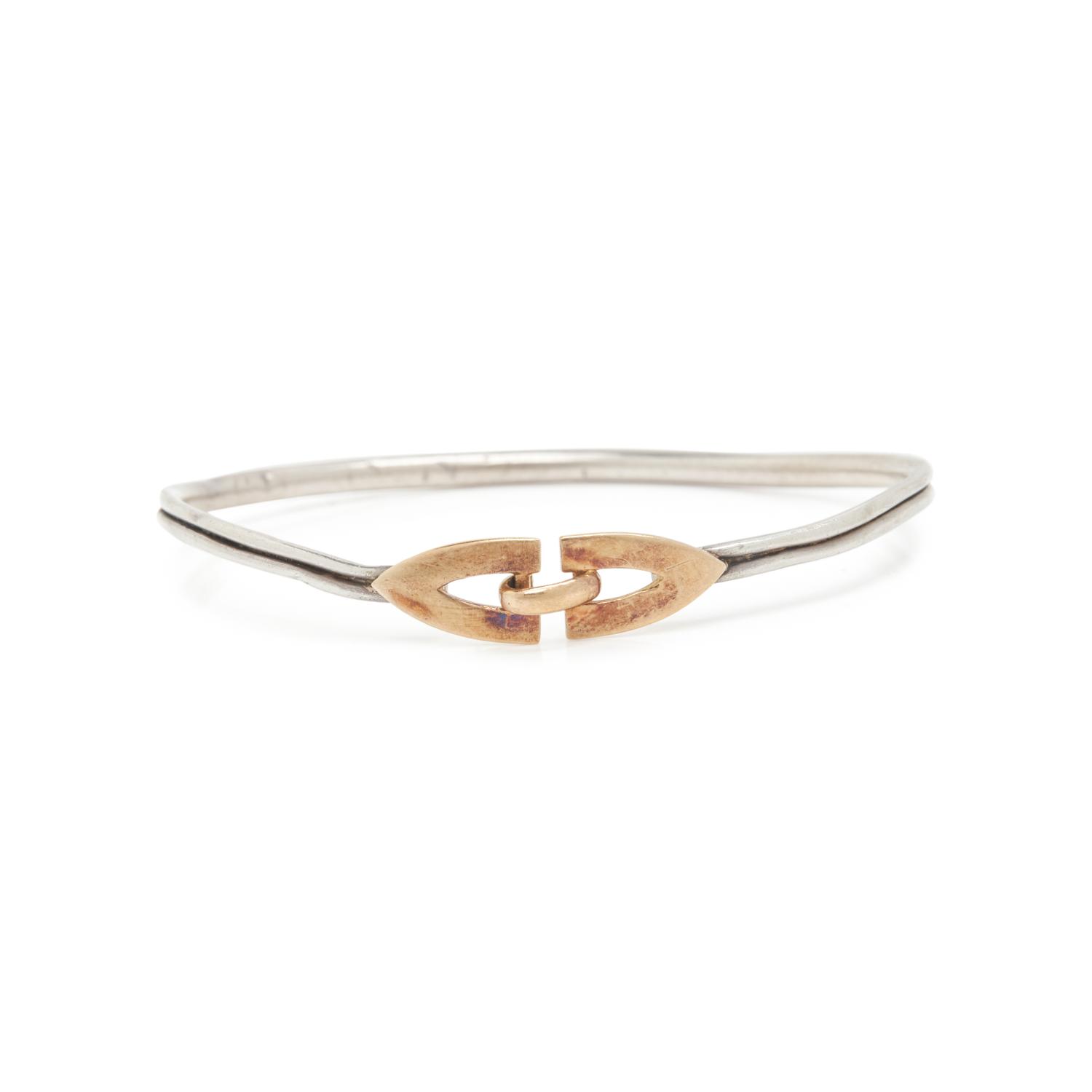 CARTIER, STERLING SILVER AND YELLOW GOLD BRACELET
