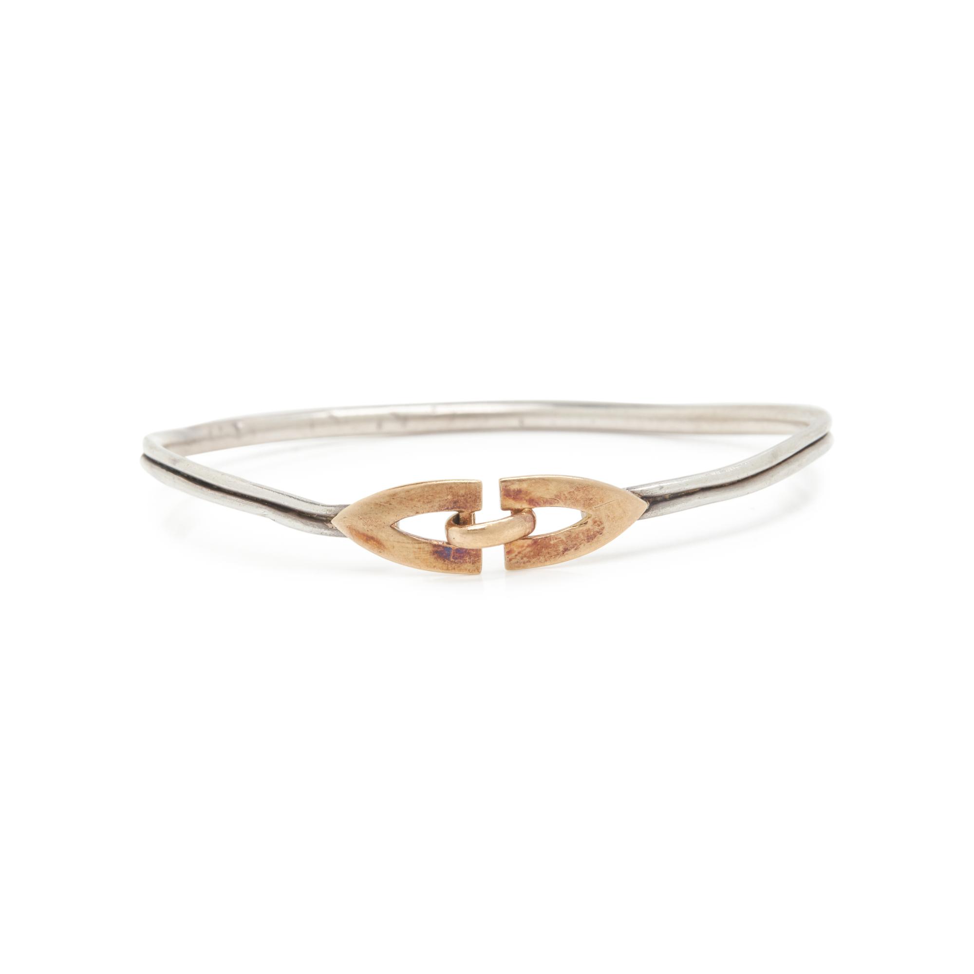CARTIER, STERLING SILVER AND YELLOW GOLD BRACELET