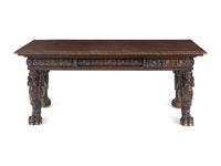 A Renaissance Revival Carved Walnut Trestle Table