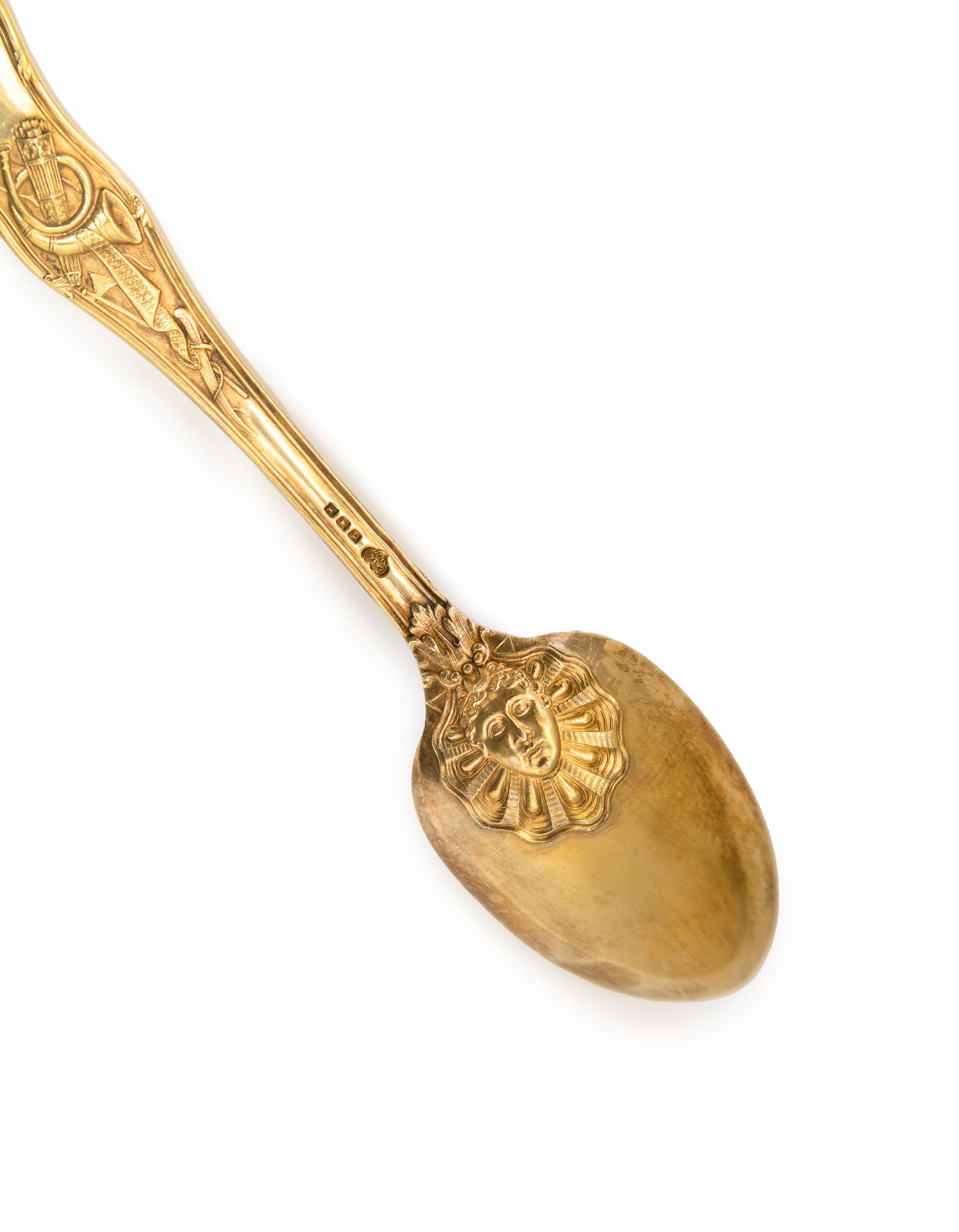 A Set of Four English Silver-Gilt Dessert Spoons