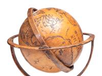 A Folk Art Painted Leather Covered Tabletop Globe