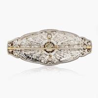 A Platinum and Diamond Brooch