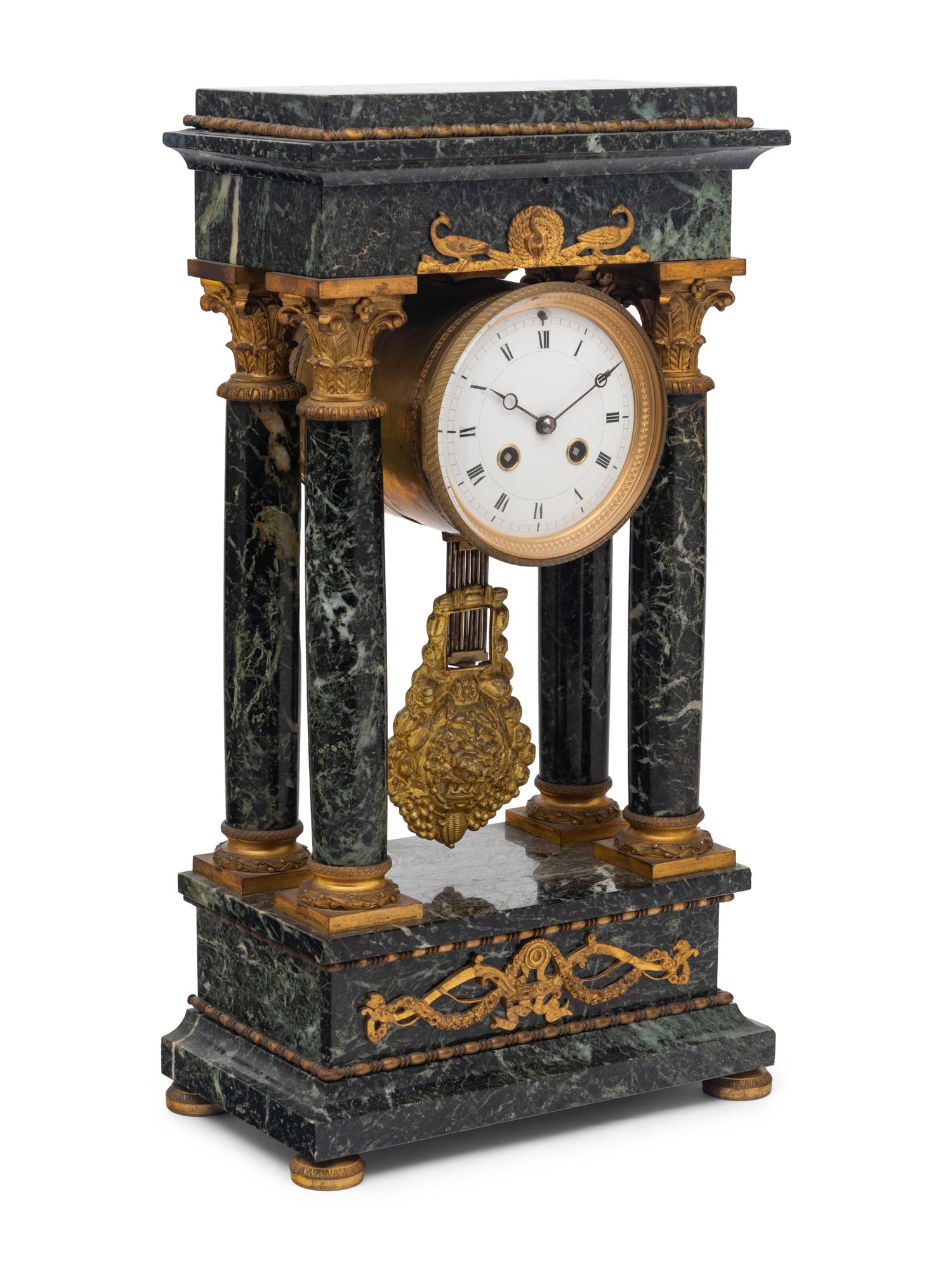 An Empire Style Gilt Bronze Mounted Marble Portico Clock