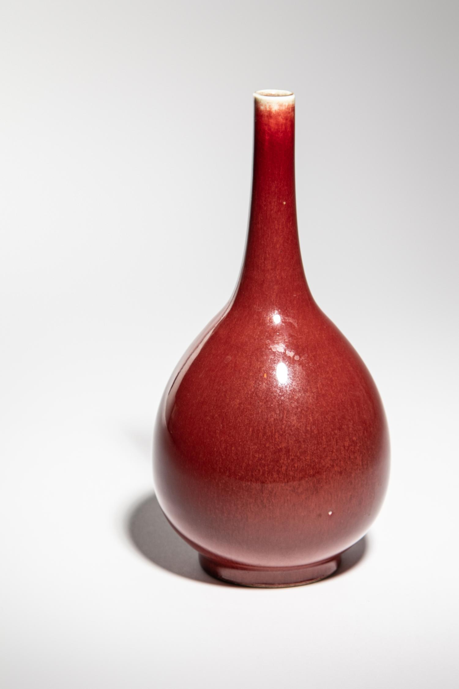 Two Sang-de-Boeuf Glazed Porcelain Bottle Vases