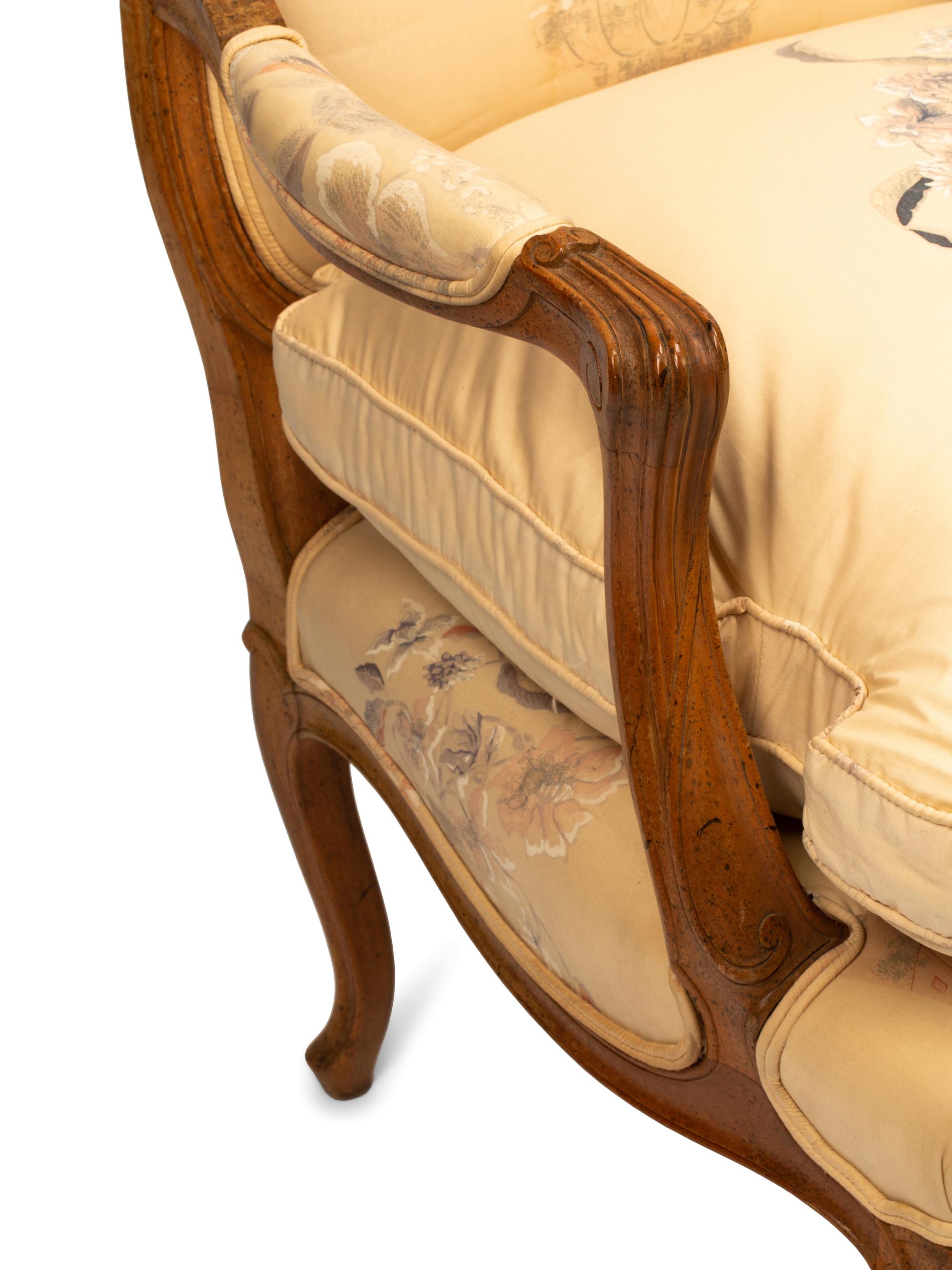 A Pair of Louis XV Provincial Style Armchairs