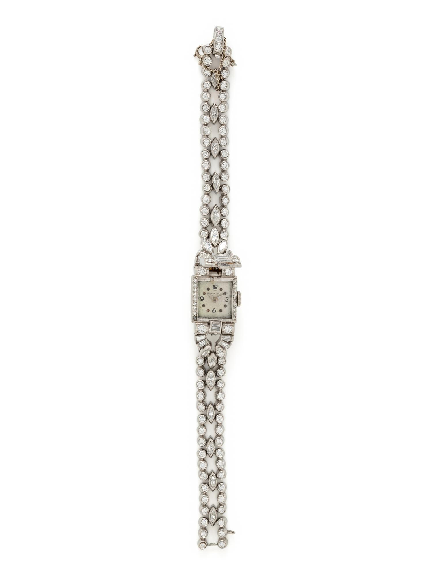 HAMILTON, PLATINUM AND DIAMOND SURPRISE WATCH