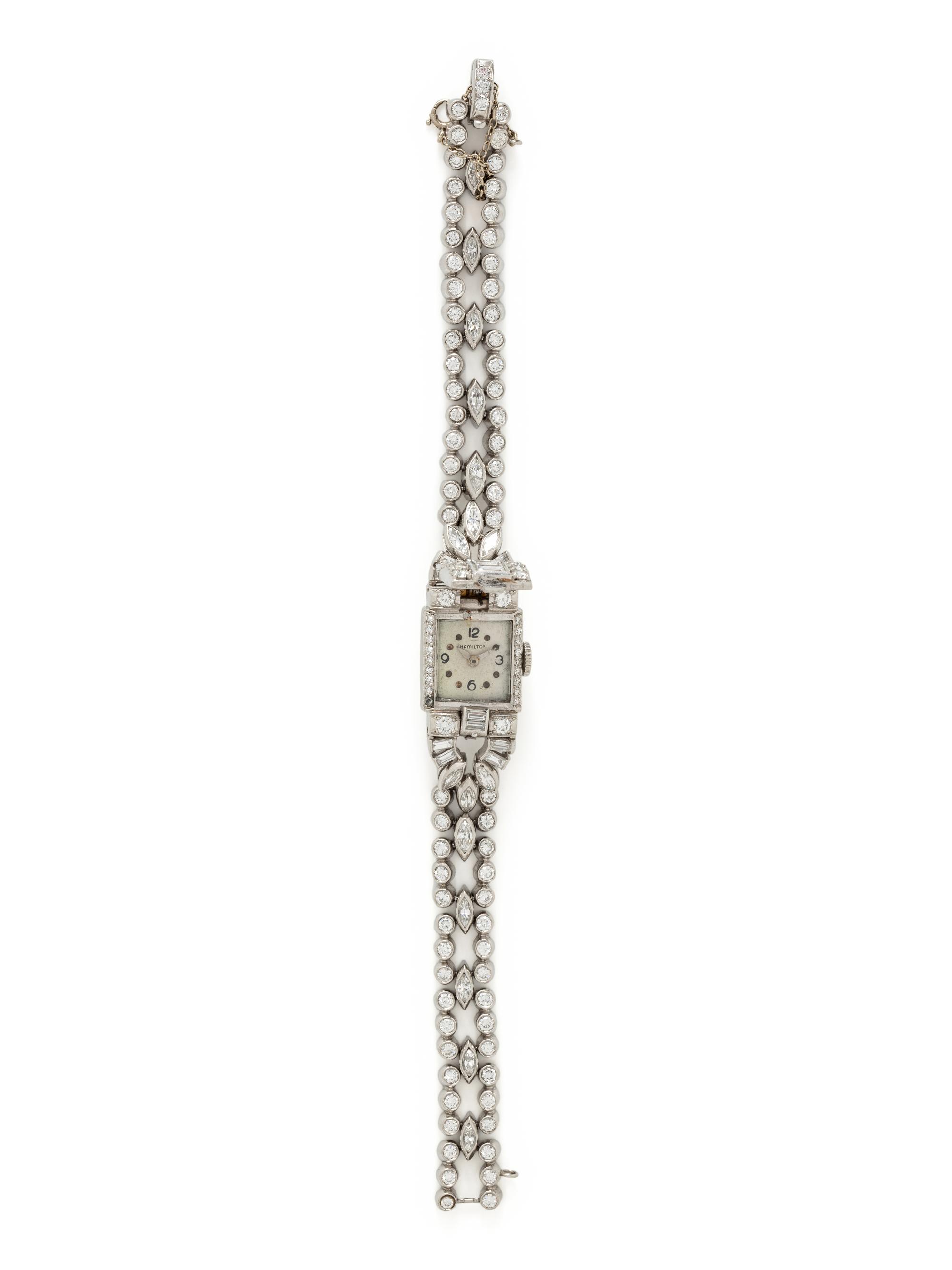 HAMILTON, PLATINUM AND DIAMOND SURPRISE WATCH