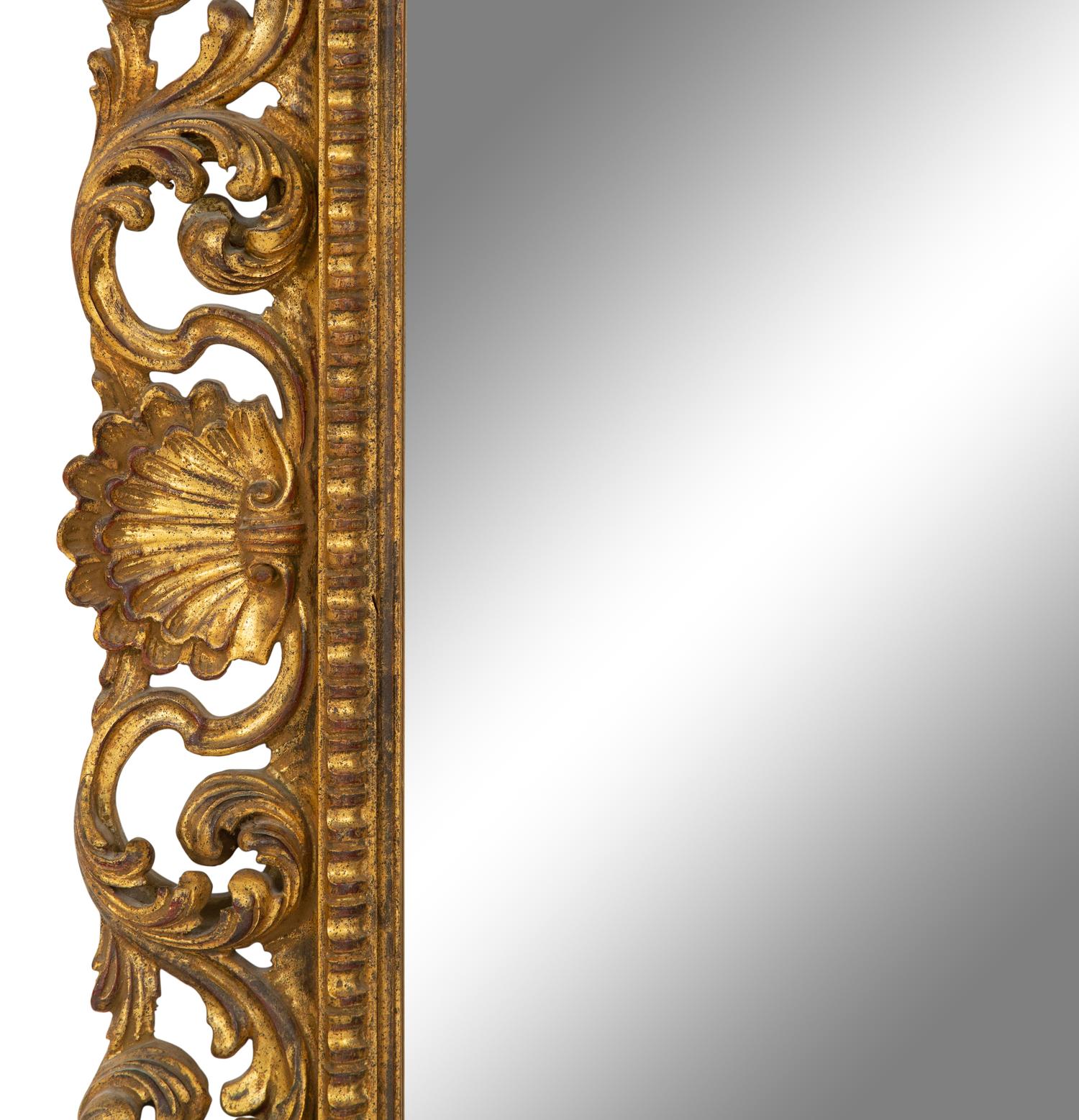 A Louis XV Style Carved Giltwood Mirror