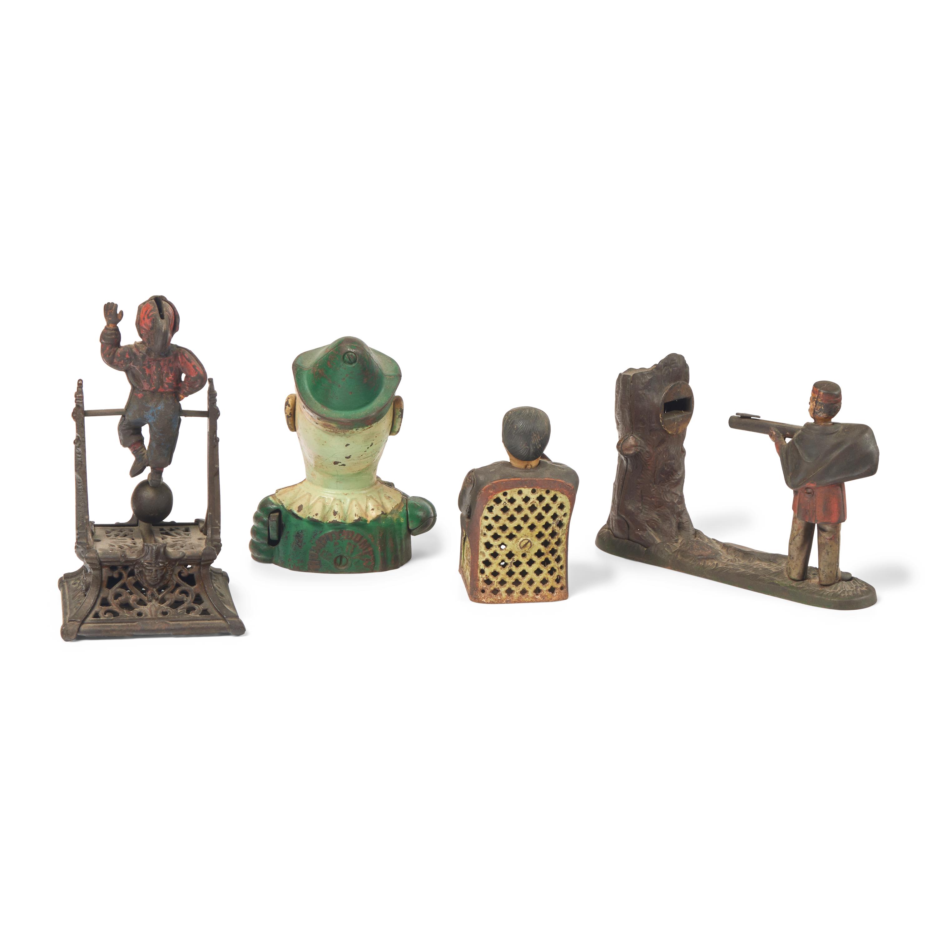 A Group of Four Figural Cast Iron Banks