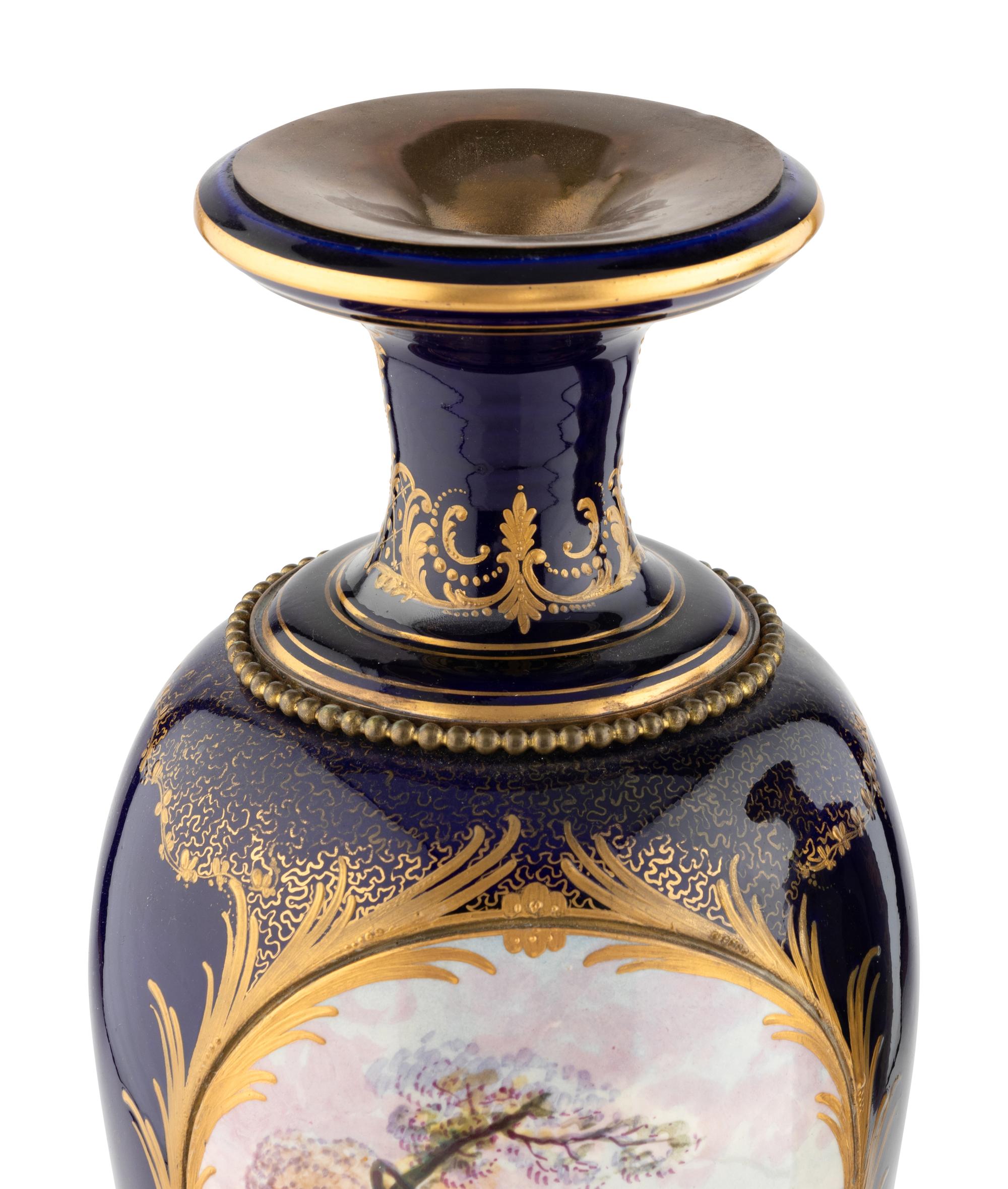 A Pair of Sèvres Style Gilt Metal Mounted Porcelain Vases